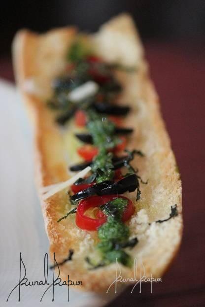 Cherry Tomato And Olive Crostini