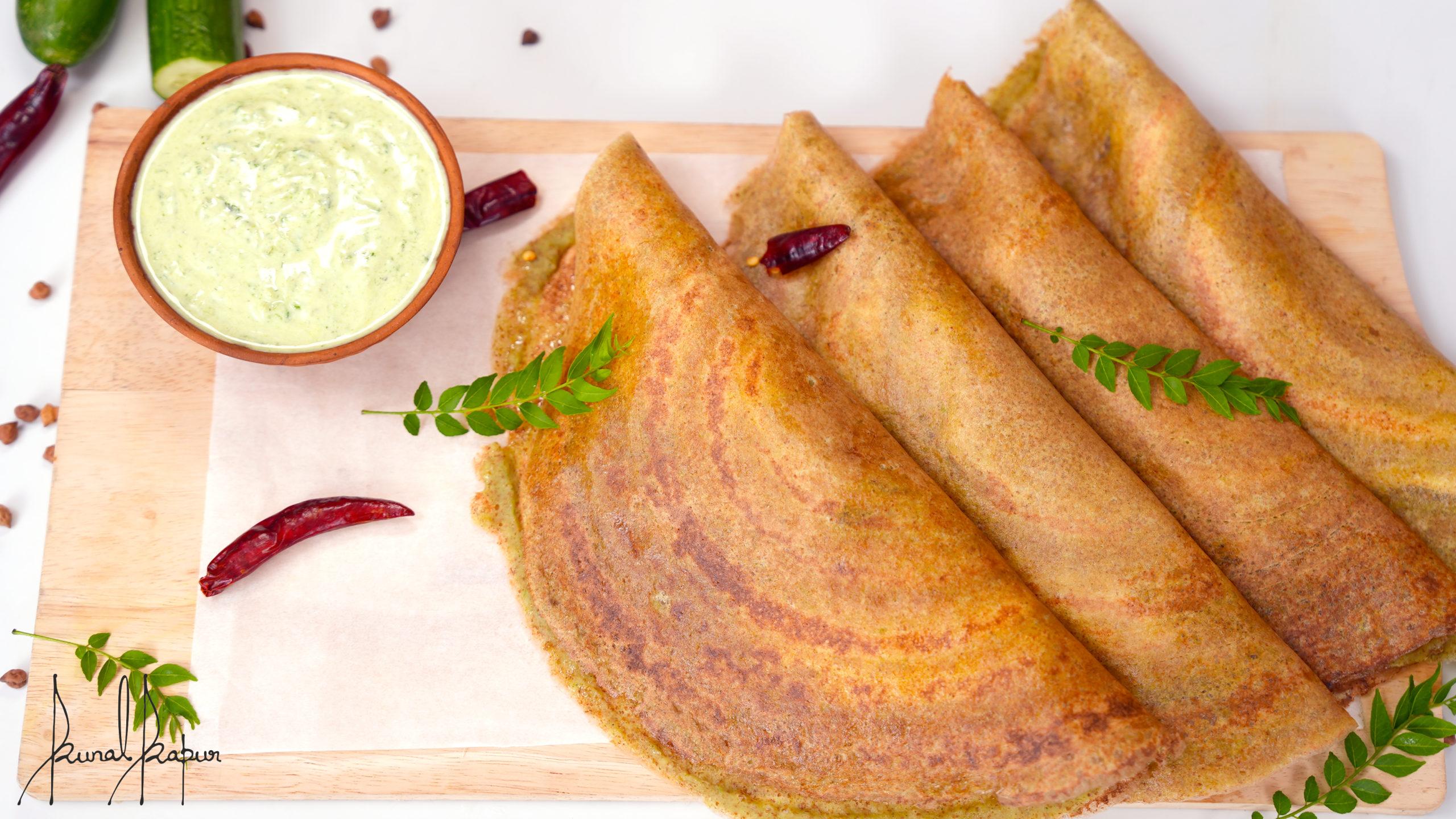 A dosa, also called dosai, dosey, or dosha, is a thin pancake in South  Indian cuisine 15933328 Stock Photo at Vecteezy